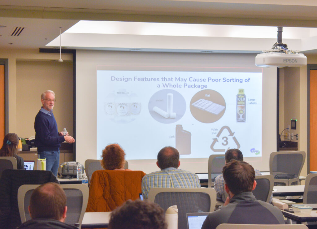 a man presenting at an APR Design Training class