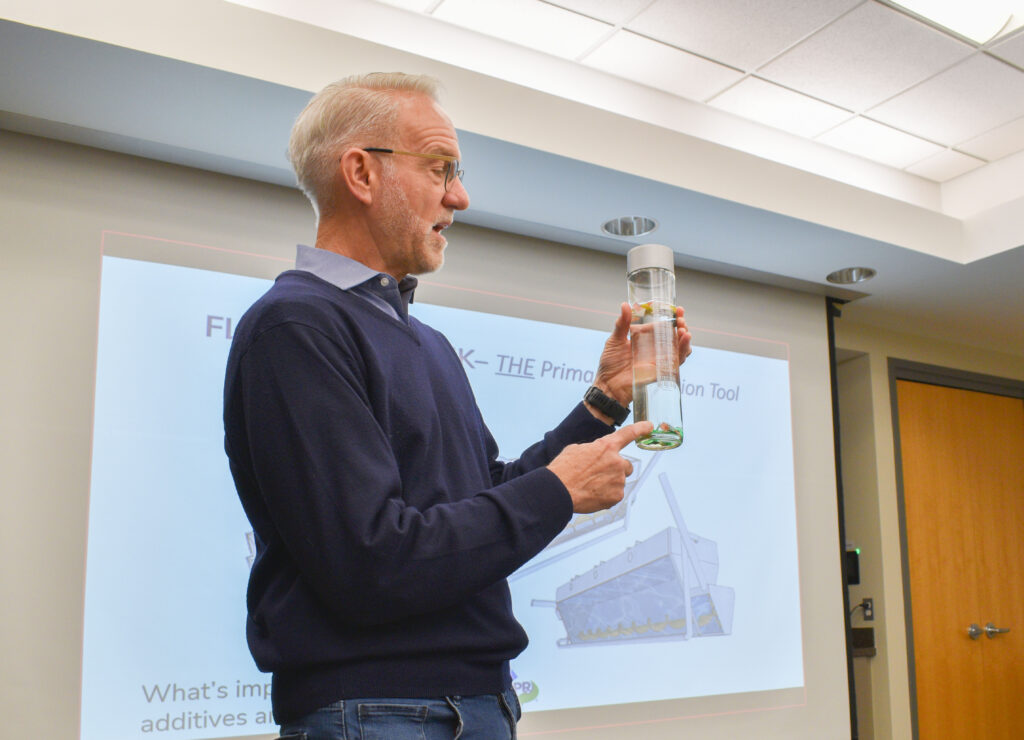 photo of a man presenting at a design training course