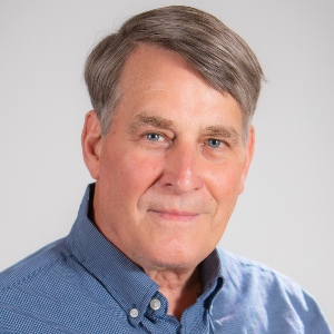 headshot of John Standish