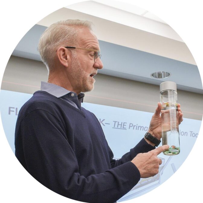 man holding a plastic bottle
